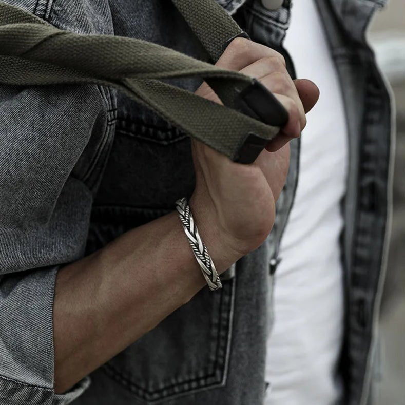 Detailed braided sterling silver cuff bracelet for men, a stylish and comfortable open cuff design.