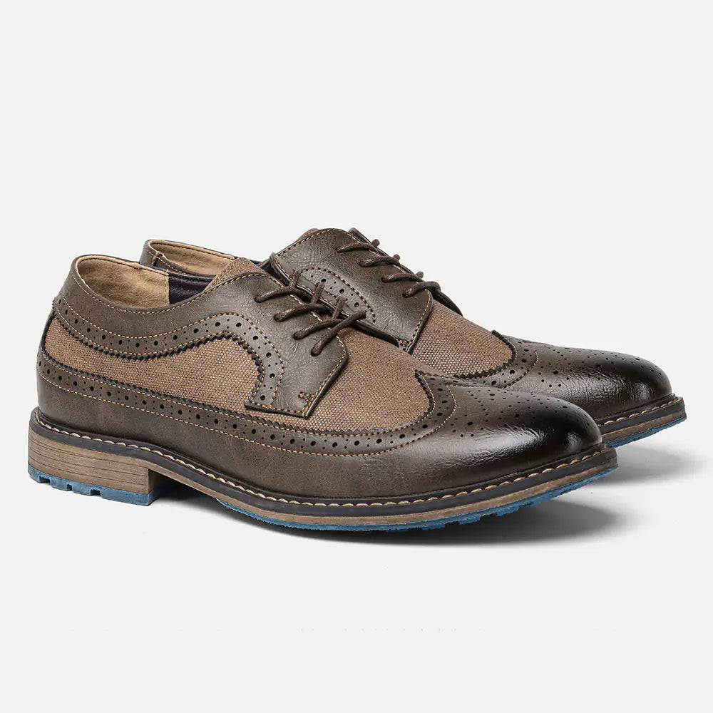 Pair of men's genuine leather brogue shoes in a rich tan color, perfect for business or special events