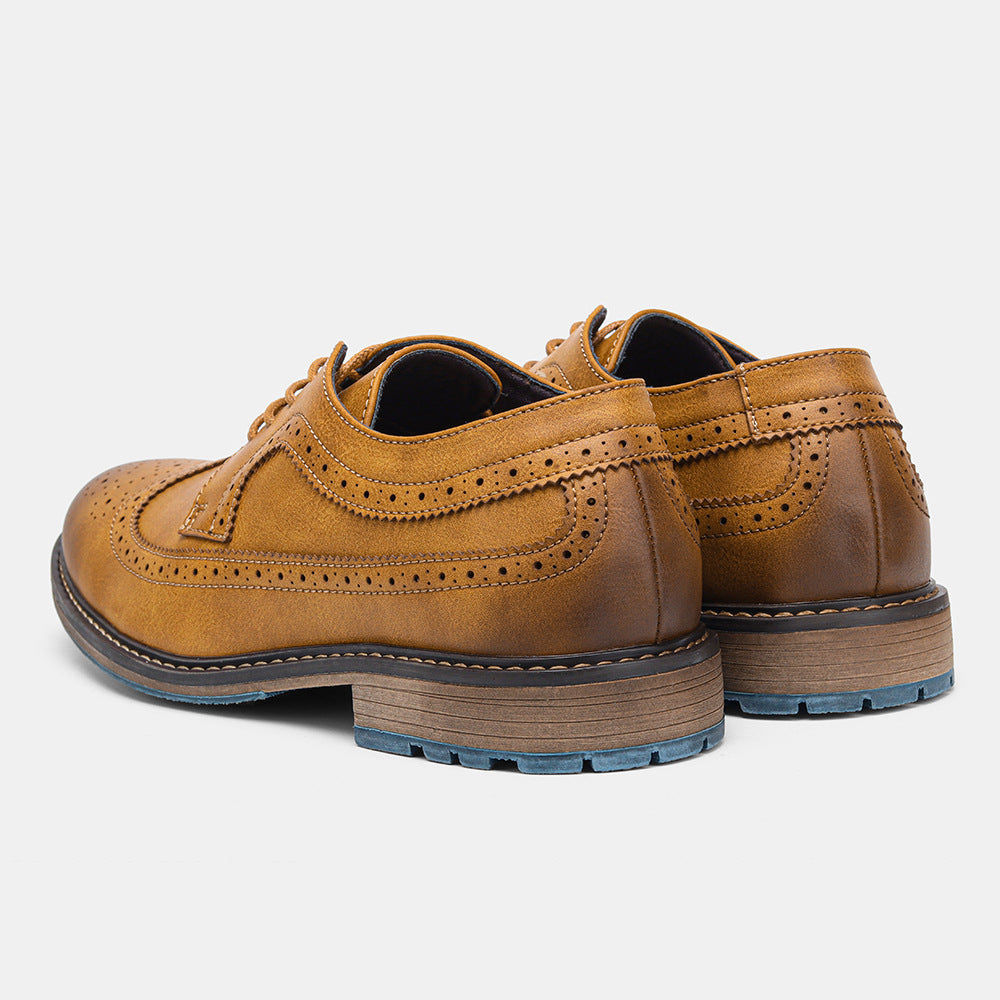 Men's dark brown leather brogue shoes on a white background, versatile for business casual or formal attire