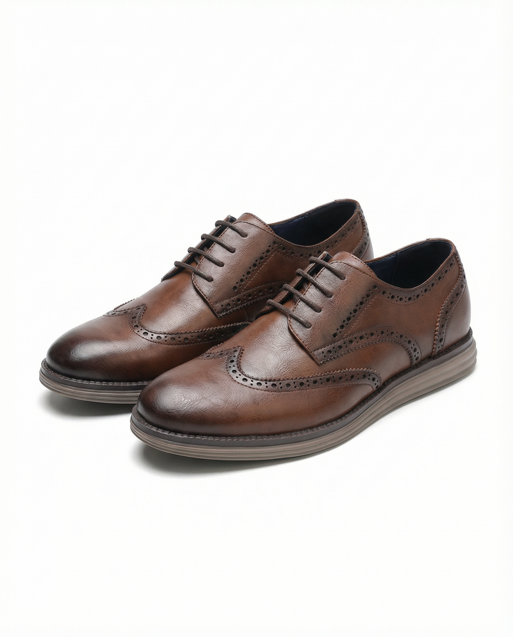 Men's classic brown leather brogue oxford dress shoes for formal and business casual outfits.