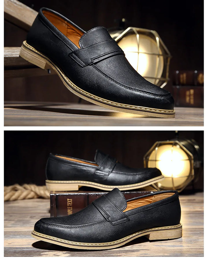 Close-up of a men's classic black leather loafer, formal dress shoe