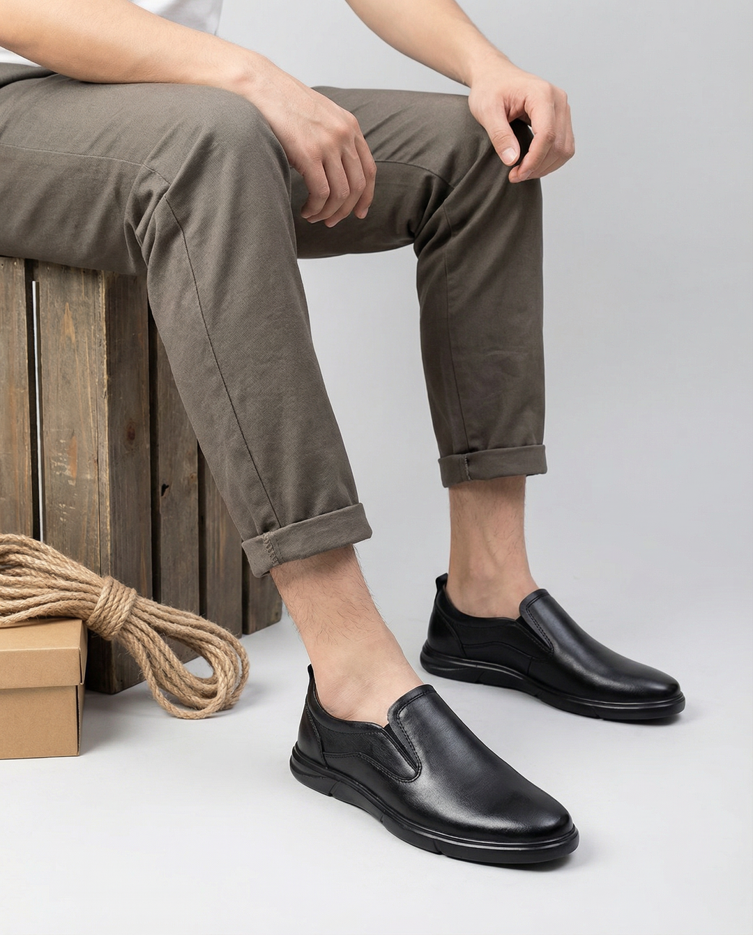 Close-up of a men's tan leather slip-on loafer showcasing the high-quality craftsmanship.