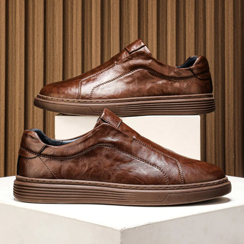 White leather men's slip-on shoes, a clean and versatile option for casual outfits, everyday footwear.