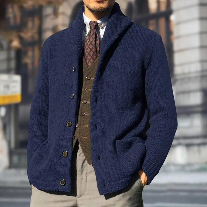 Front view of a well-fitted men's cable knit button-front cardigan, highlighting its elegant drape.