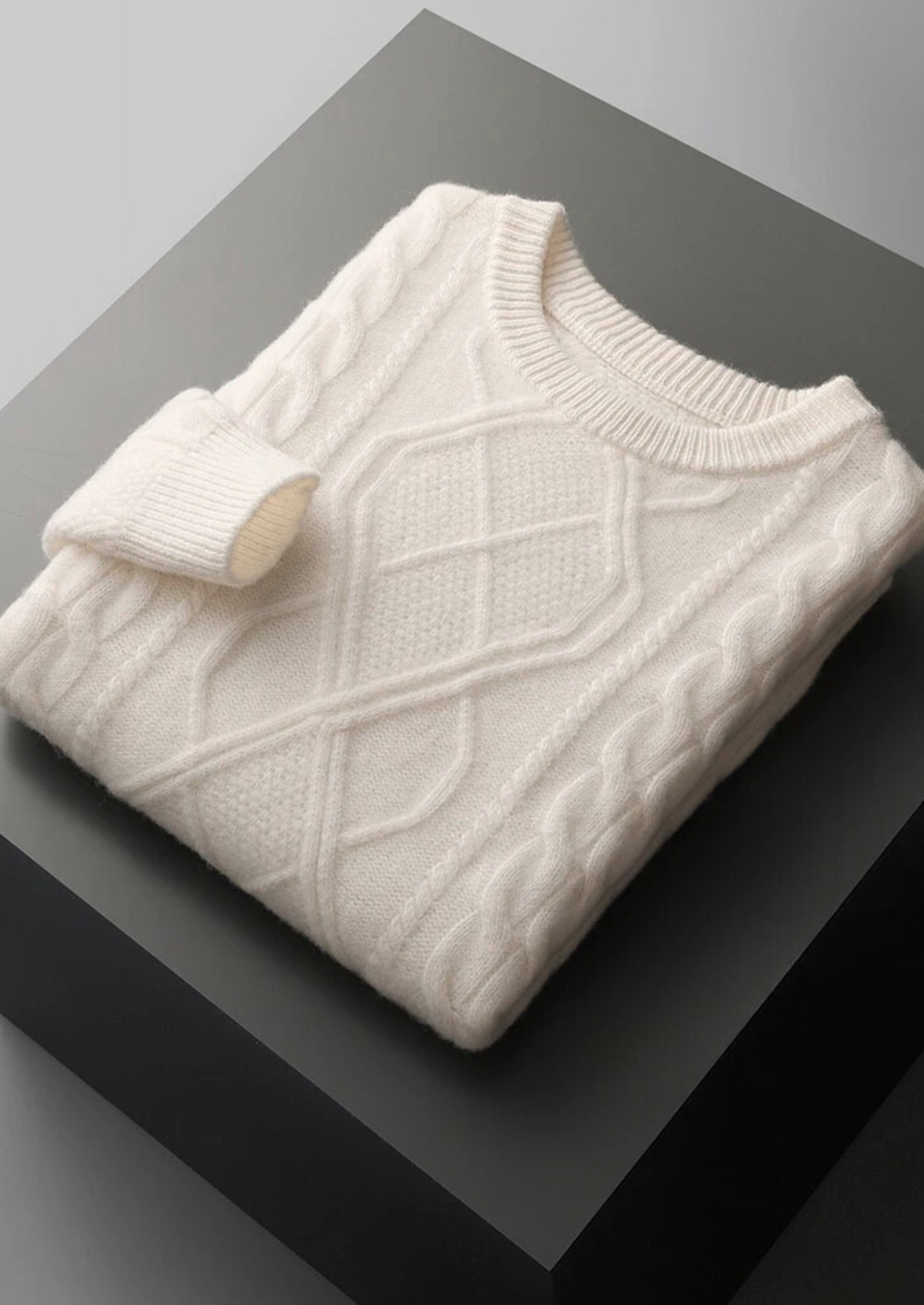 Stylish men's cable knit sweater, a versatile crew neck layering piece for casual winter outfits.