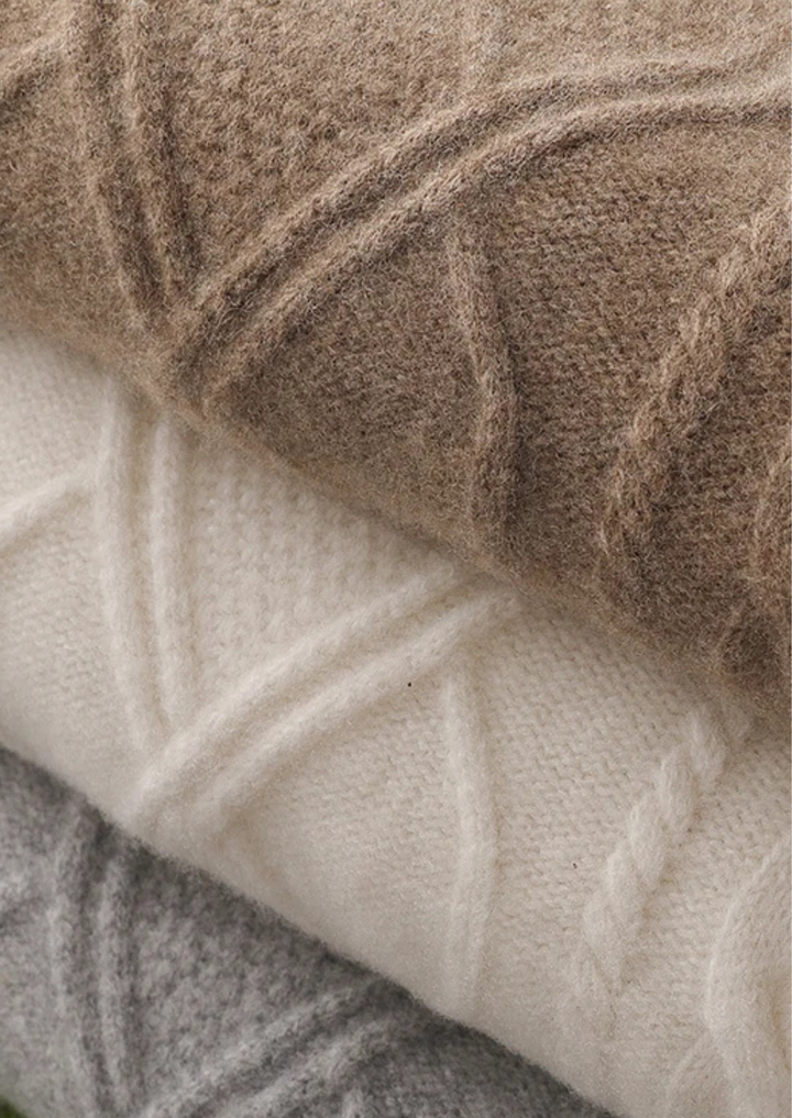 Warm men's classic cable knit sweater, a stylish and cozy crew neck for cold weather.
