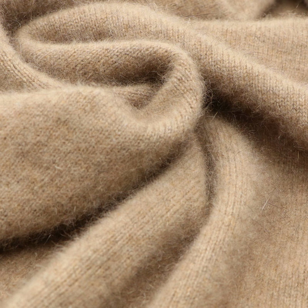 Stylish man wearing a blue cashmere blend crewneck sweater, perfect for winter fashion