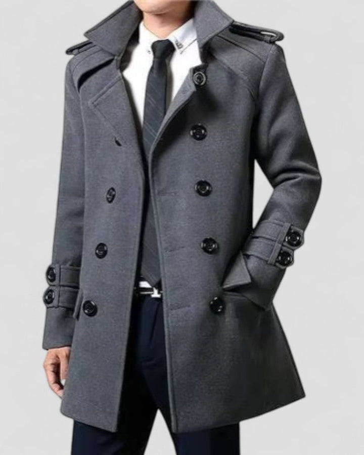 Stylish men's double-breasted trench coat, featuring sharp lapels & a versatile mid-length, ideal for formal or casual outfits.