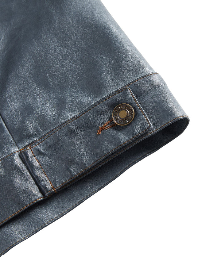 Close-up of the collar and lapel on a men's black faux leather biker jacket, detailing the classic cut
