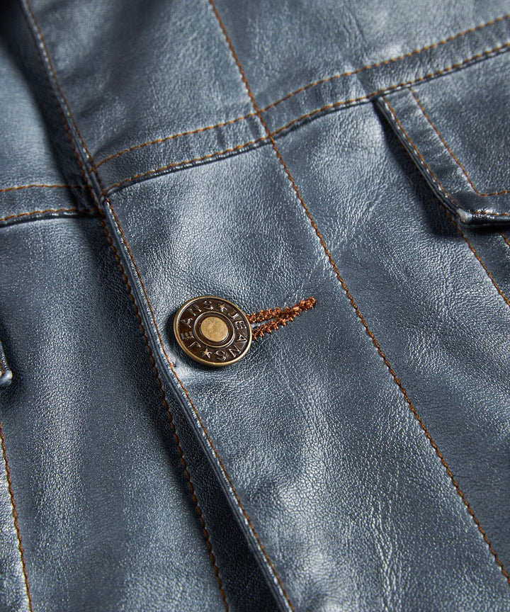 Detail of zipper and snap buttons on a men's faux leather biker jacket, hardware close-up, outerwear