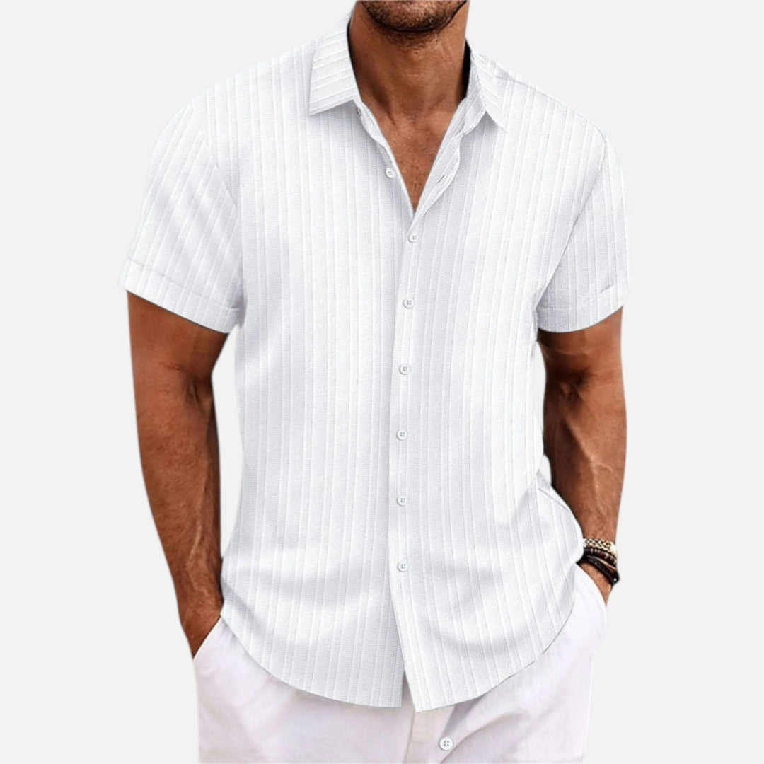 Versatile men's summer polo. Effortless classic fit, short sleeve top for spring fashion and casual occasions.