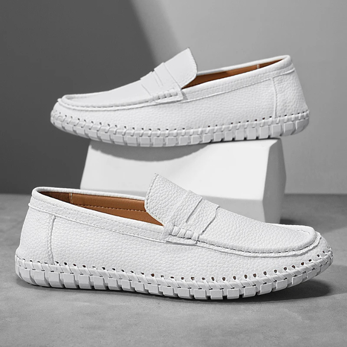 Back view of men's comfortable full-grain leather loafers, showing heel design