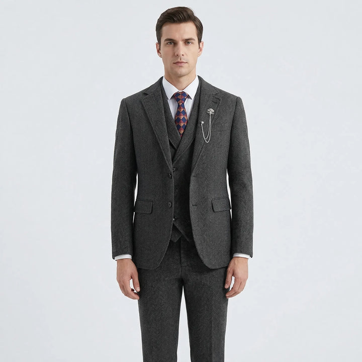 Detail of the men's tailored herringbone waistcoat (vest) from a classic 3-piece suit, essential formal attire.