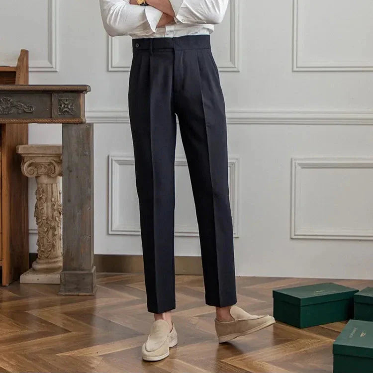 Close-up of the hem of men's straight leg dress pants, showing the clean and finished edge