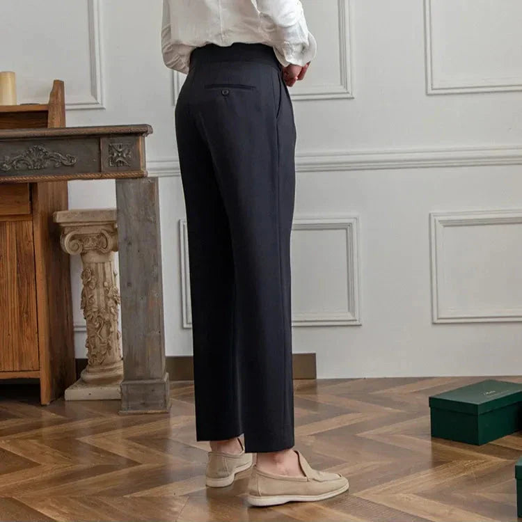 Model walking in men's comfortable straight leg dress pants, demonstrating ease of movement