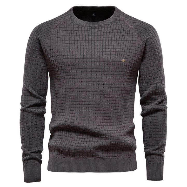 Comfortable men's knitted crewneck sweater, a timeless piece for any man's winter apparel collection.