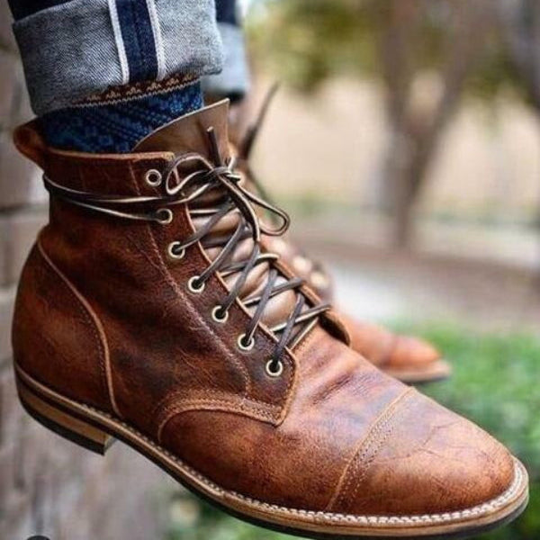 Classic men's lace-up ankle boots. Durable, closed toe design for stylish fall & winter men's fashion.