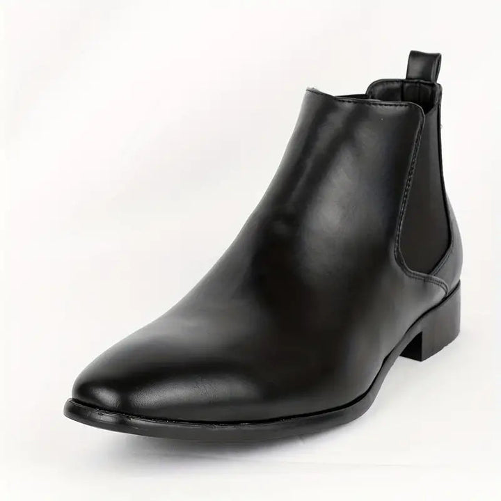 Stylish men's black leather Chelsea boots, slip-on design, perfect for formal wear