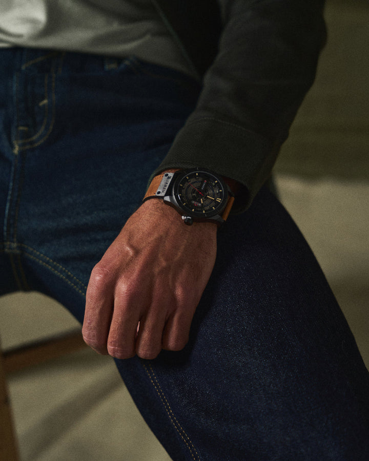 Stylish men's watch, dark brown leather band, clear white dial, perfect everyday accessory