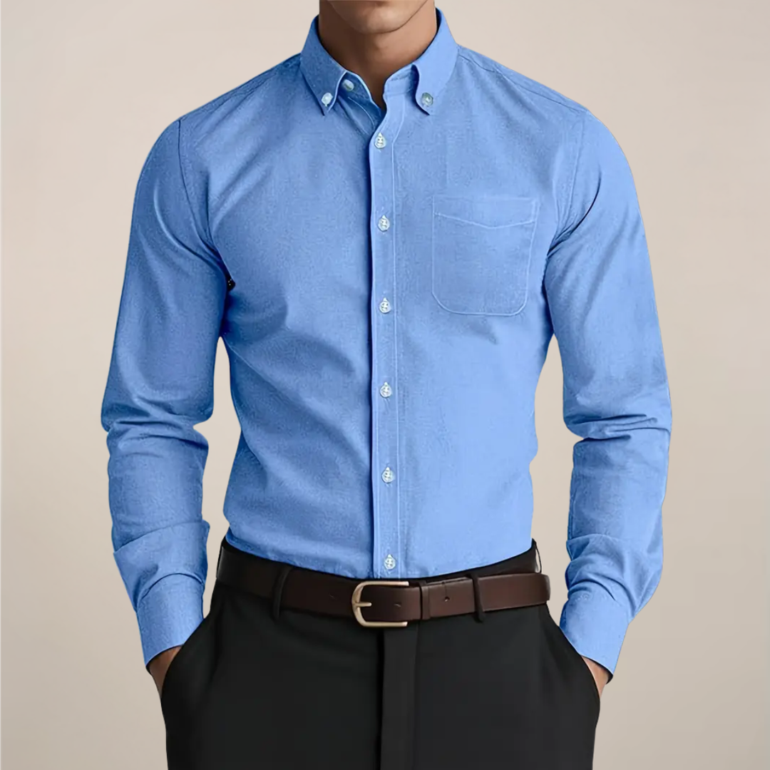 Man wearing a stylish long sleeve button-up shirt, showcasing its comfortable fit for all-season casual or professional wear. Mens fashion.