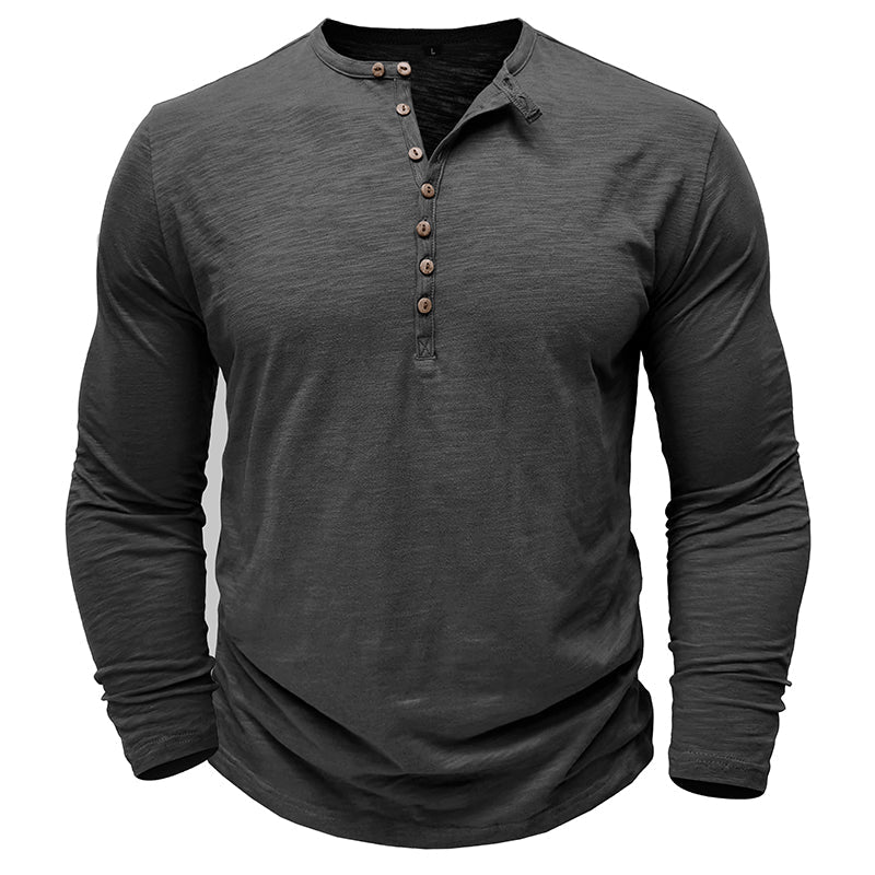 Relaxed fit men's long-sleeve henley shirt, offering ultimate comfort and versatile style for daily wear