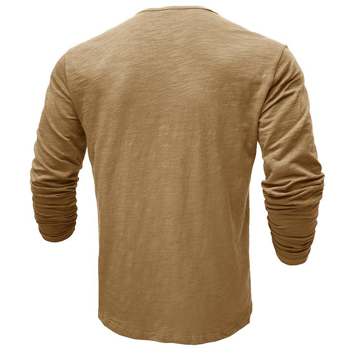 Detailed shot of the button placket on a men's long-sleeve henley shirt, adding to its casual appeal
