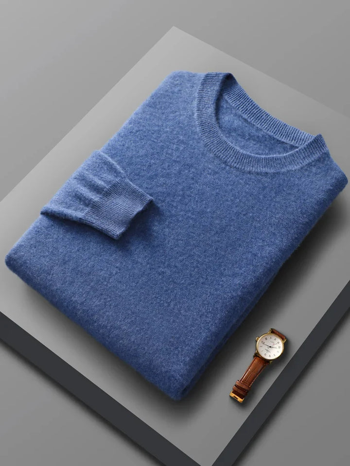 Comfortable men's merino wool crew neck sweater in a light blue, breathable and soft for all-day wear.