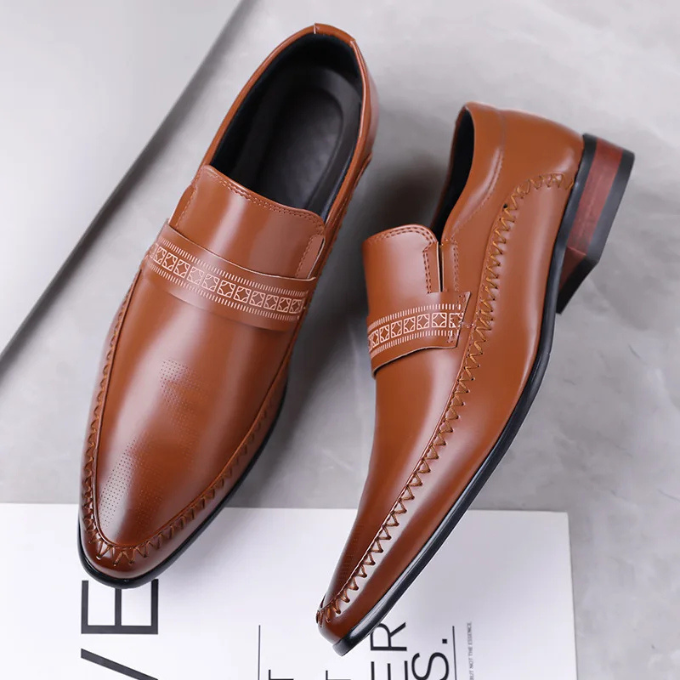 A pair of men's sleek black polished leather dress shoes, classic style for formal occasions.
