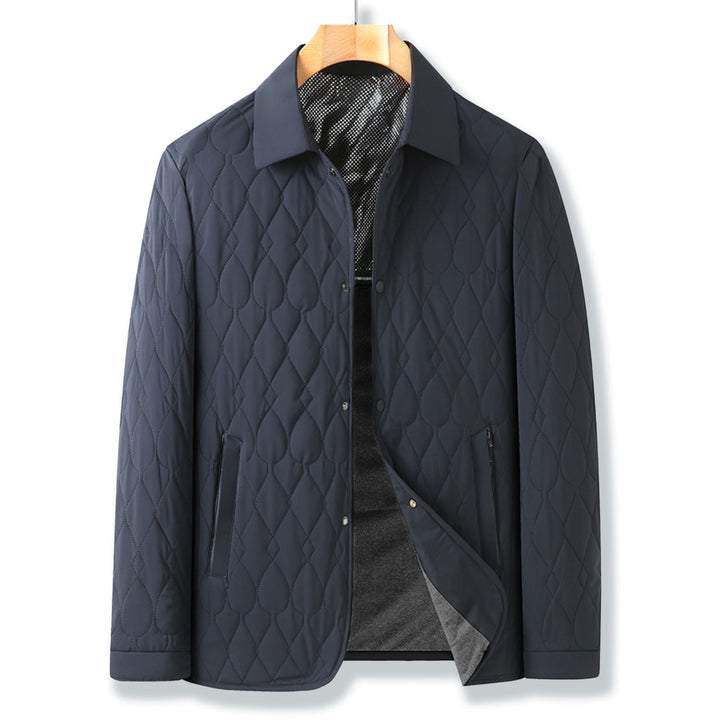 Classic men's quilted button-down jacket, great for elevating fall outfits & providing winter warmth.