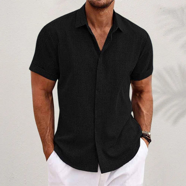 Comfortable men's relaxed fit short sleeve button shirt with classic collar, ideal for everyday casual wear.