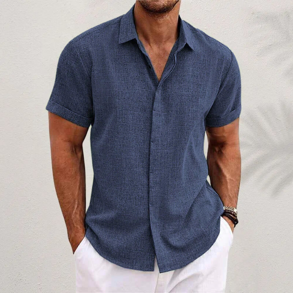 Stylish men's relaxed fit short sleeve button shirt with a classic collar, perfect for casual men's fashion.