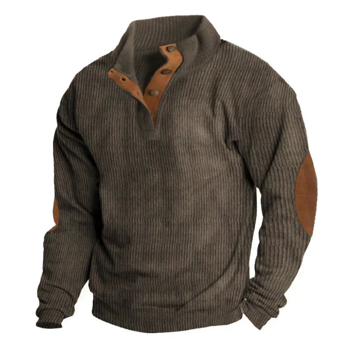 Close-up of a men's classic ribbed knit sweater texture, highlighting the knitwear detail.
