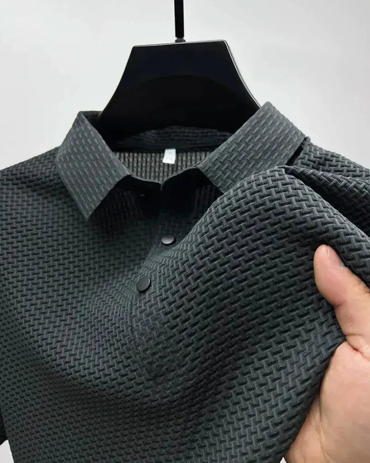 Stylish men's classic short-sleeve polo shirt. Ideal for a smart-casual look, office wear, and versatile everyday fashion.