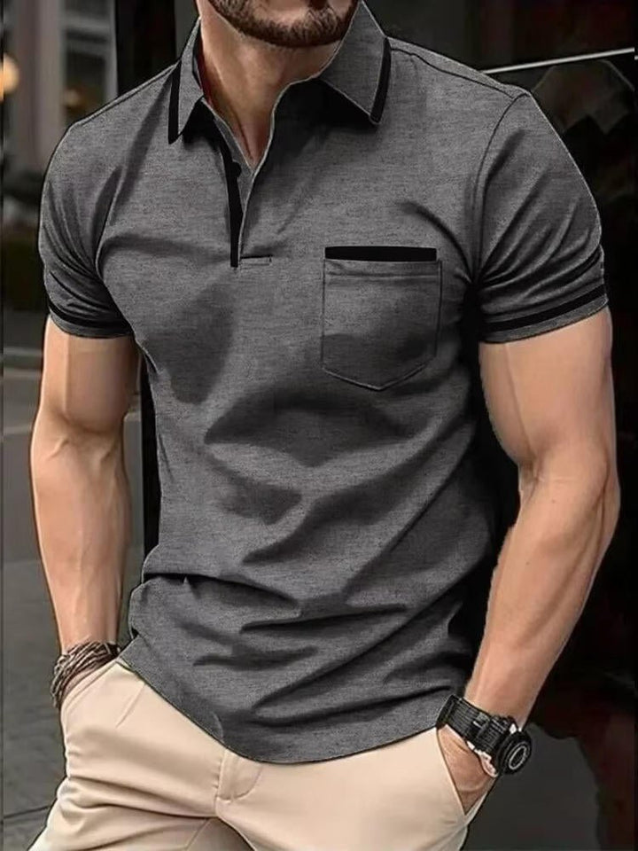 Casual men's short sleeve polo shirt with chest pocket, perfect for everyday comfort and a classic, versatile look.
