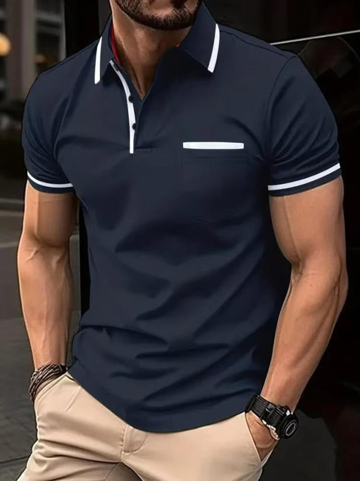 Men's classic short sleeve polo shirt featuring a functional chest pocket. Ideal comfortable and versatile daily top.