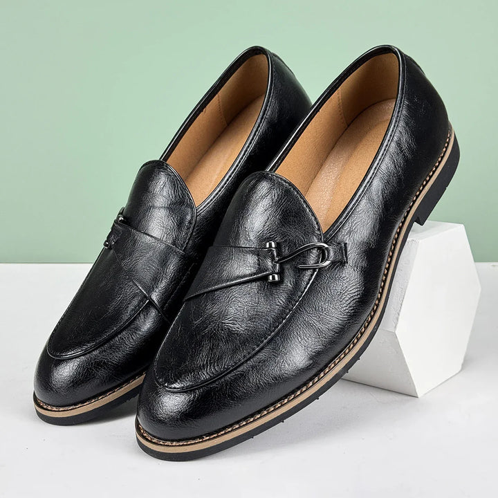 Brown leather men's slip-on bit loafers, stylish and versatile dress shoes.