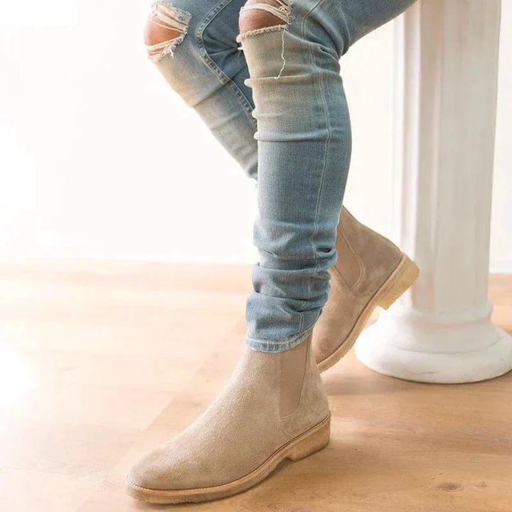Sleek men's Chelsea boots, easy slip-on style for modern men's everyday footwear. Comfortable and versatile ankle boots.