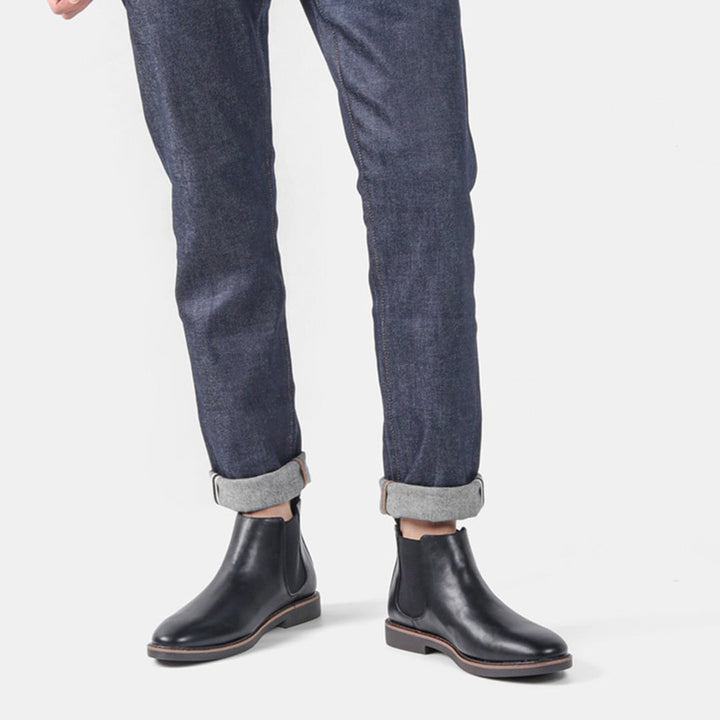 Men's Classic Slip-On Chelsea Boots lined up, showcasing various color options and timeless style