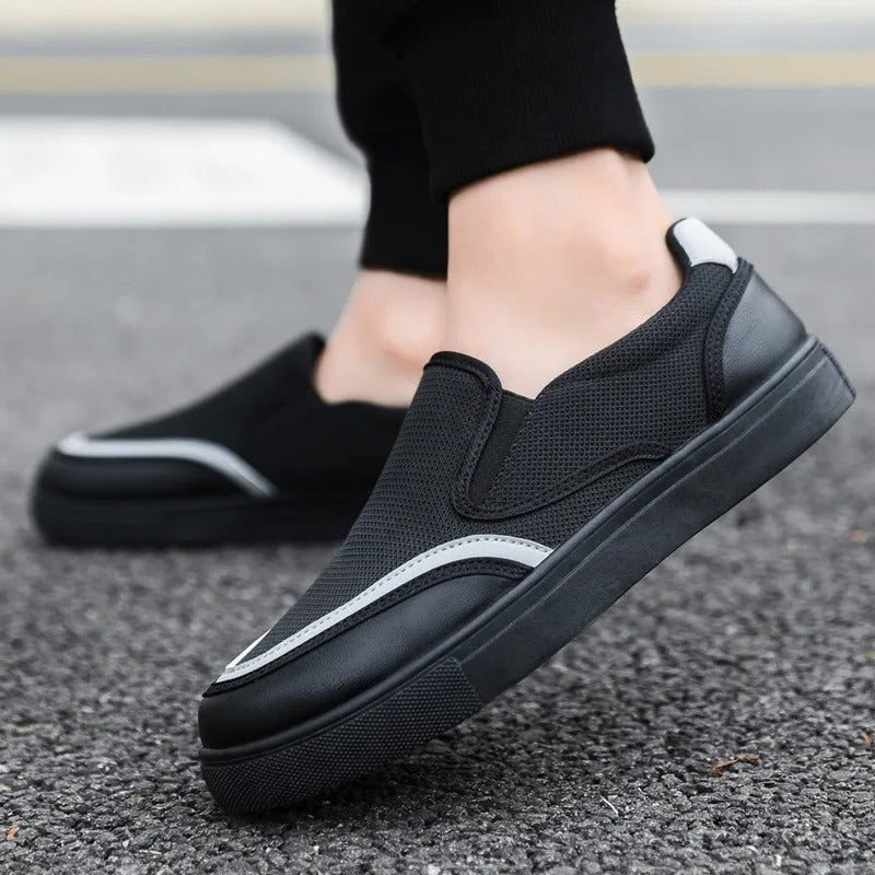 Front view of men's khaki slip-on loafers, showcasing the timeless design & quality.