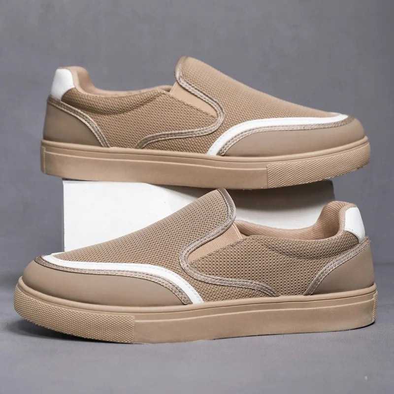Pair of classic men's slip-on deck loafers, ready for everyday fashion & comfort.
