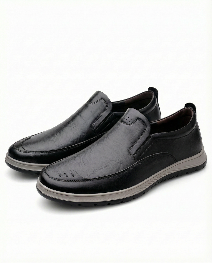 Back view of men's durable leather loafers, ready for comfortable slip-on wear