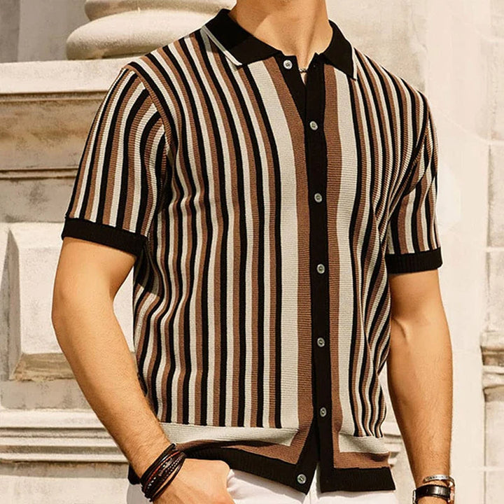 Man in a relaxed fit men's striped polo shirt. Short sleeve, perfect for smart casual summer style & versatile fashion.
