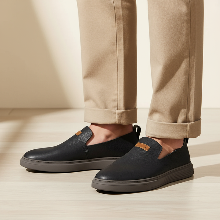 Close-up of men's brown leather loafers, showcasing the classic stitching and comfortable sole