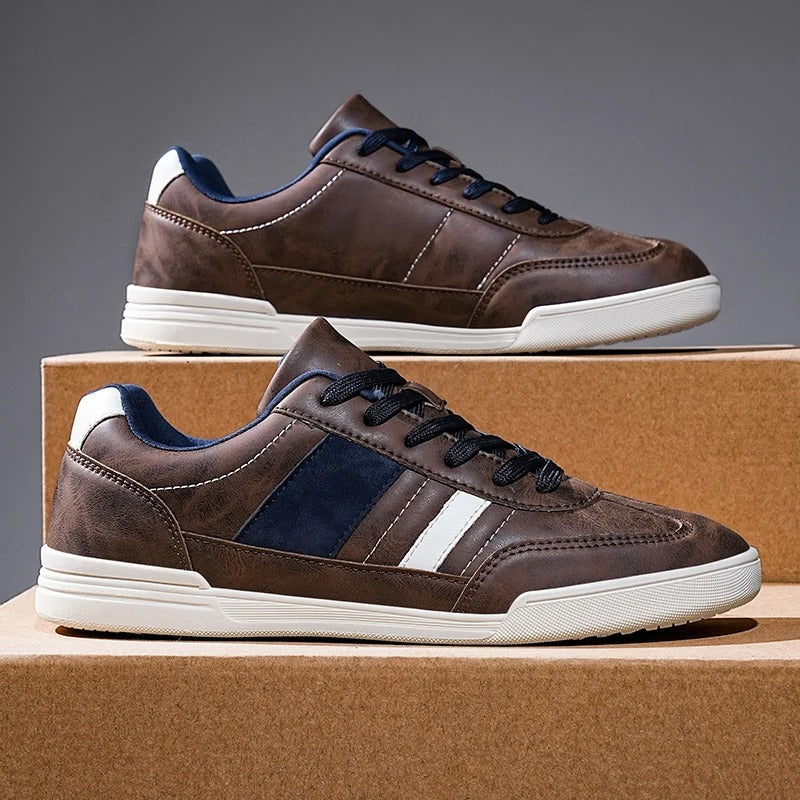 Gray men's casual sneakers, distressed look, ideal for urban footwear and everyday fashion.