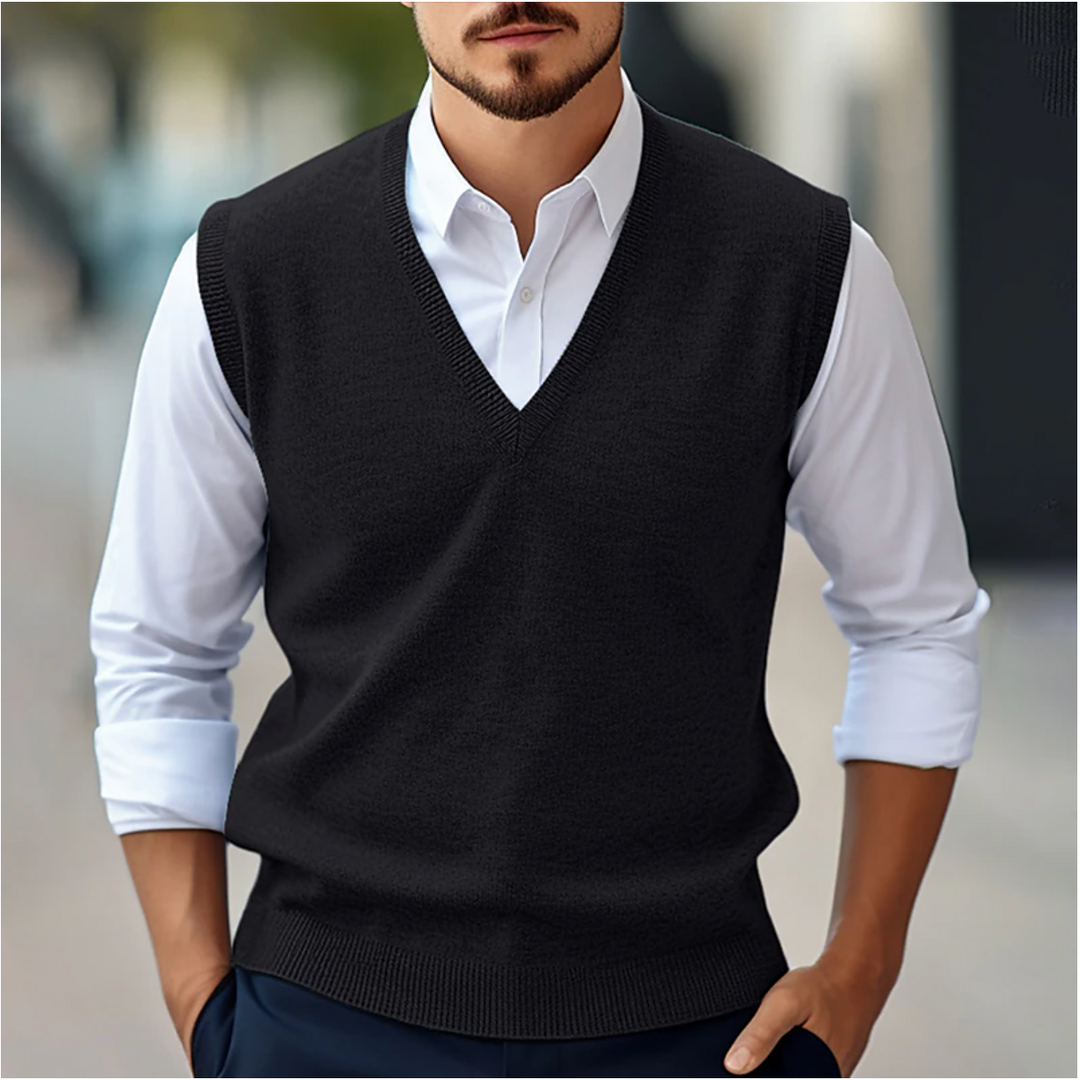 Men's V-neck sleeveless sweater vest in adaptable gray, great for all-season layering & business casual style.