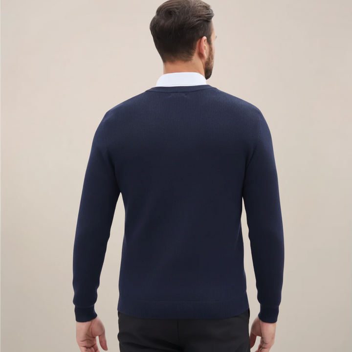 Sophisticated men's V-neck sweater, ideal for fall fashion. Soft knit for comfortable winter layering and timeless style.