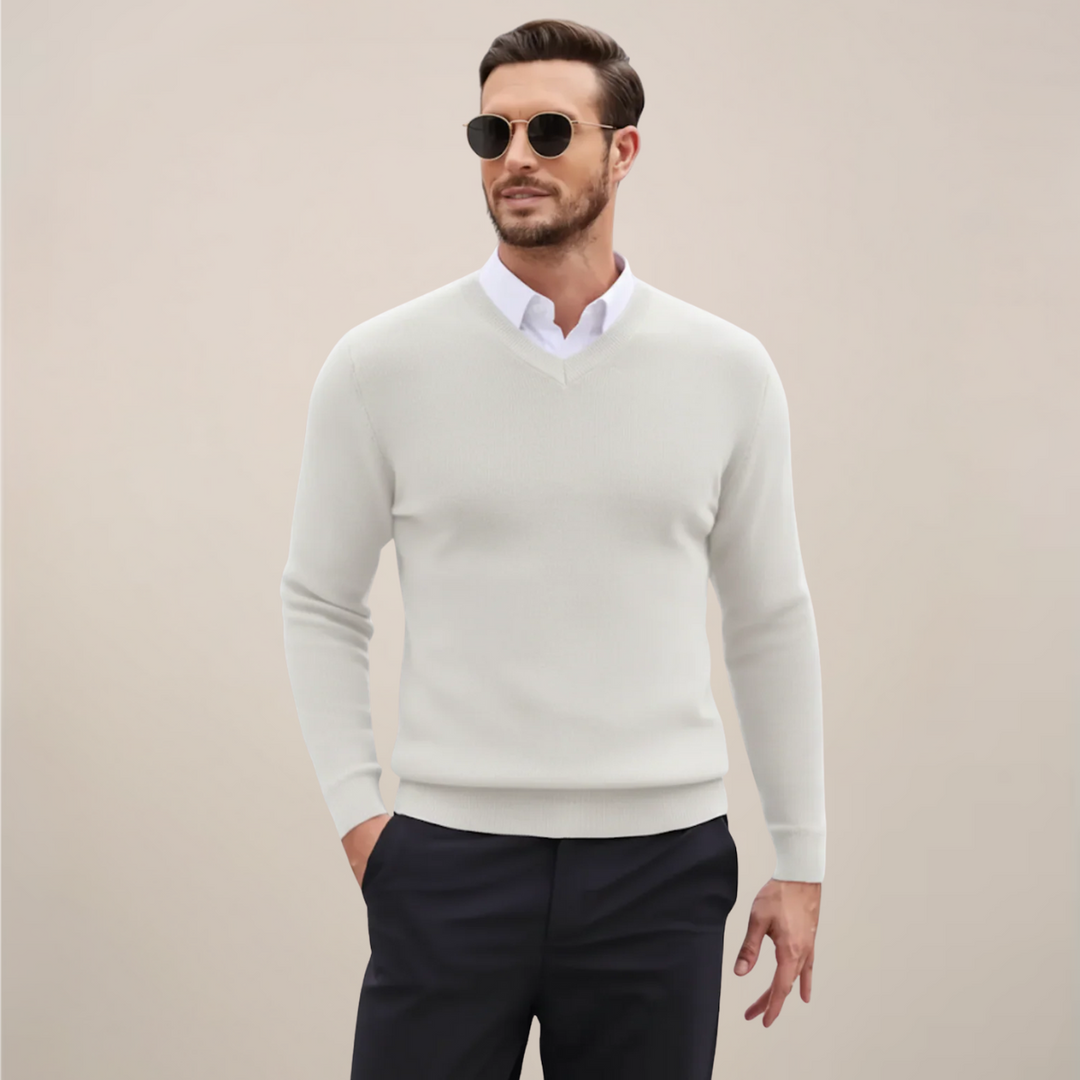 Stylish men's V-neck sweater, perfect for layering during fall & winter. Combines comfort with a sophisticated, classic look.