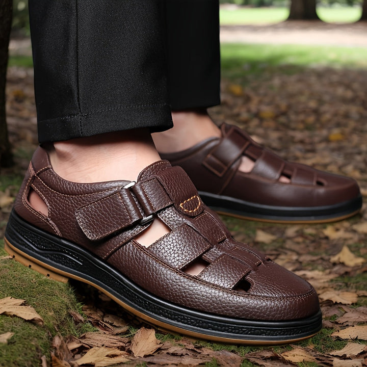 Versatile men's summer footwear, closed-toe and adjustable strap for beach, walking, or casual wear.