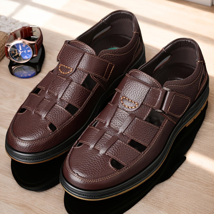 Durable men's closed-toe sandals with secure adjustable strap, great for outdoor summer activities.
