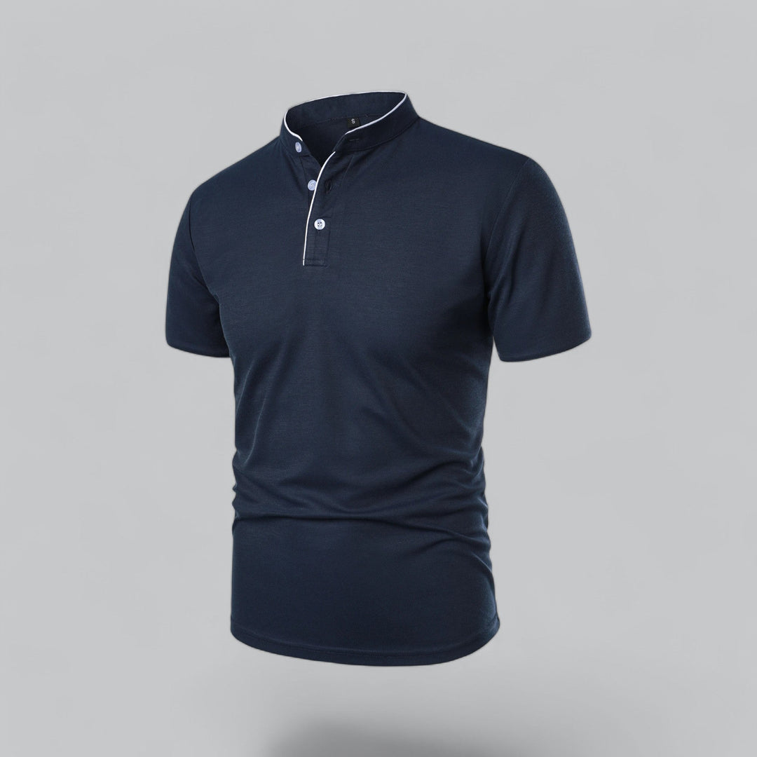 Men's collarless polo shirt styled with jeans for a relaxed, smart casual look. Short sleeve & versatile.